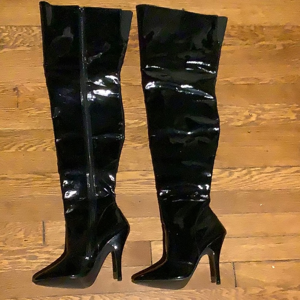 Black patent leather Pleaser size 7 thing high boots
